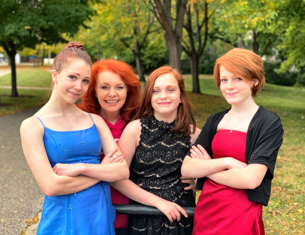 The Ginger Optimist with her three granddaughters